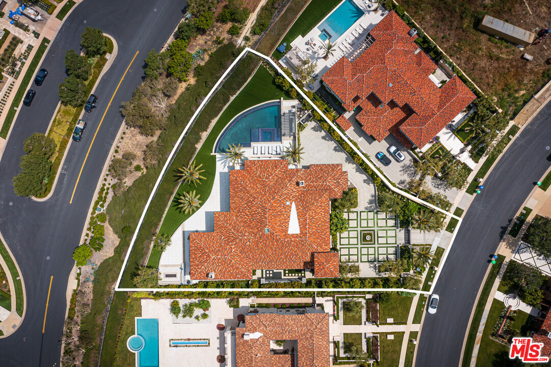 28 Tide Watch Newport Coast, CA 92657 - Photo 23 of 23 an aerial view of a residential apartment building with a yard