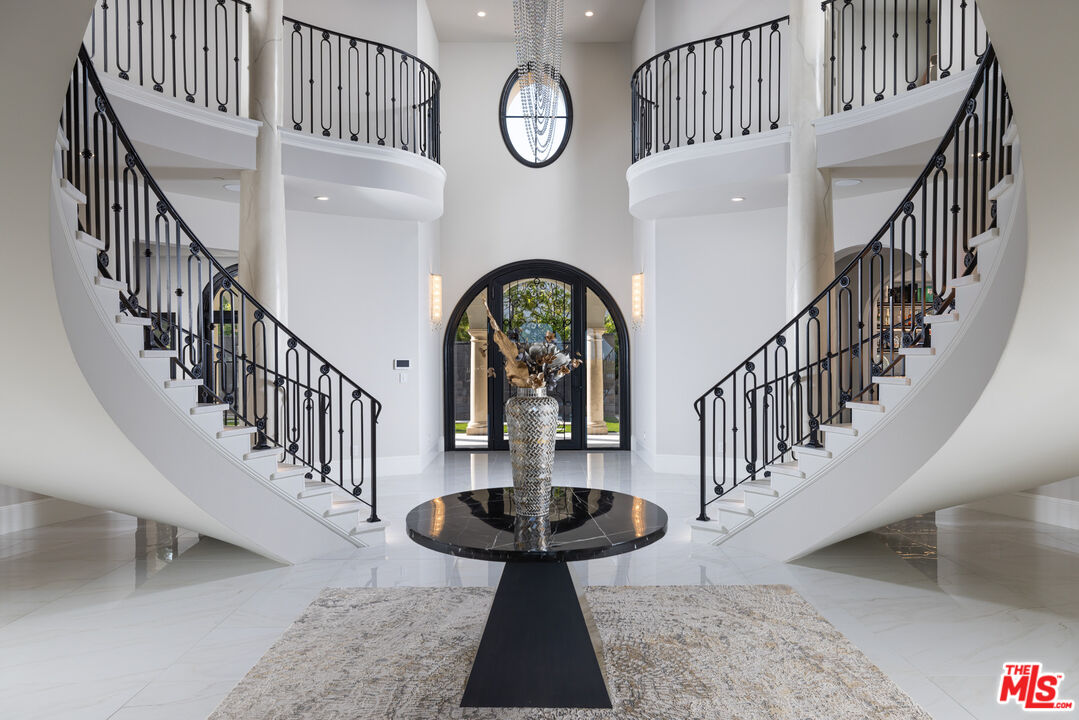 28 Tide Watch Newport Coast, CA 92657 - Photo 4 of 23 a view of entryway and hall with wooden floor