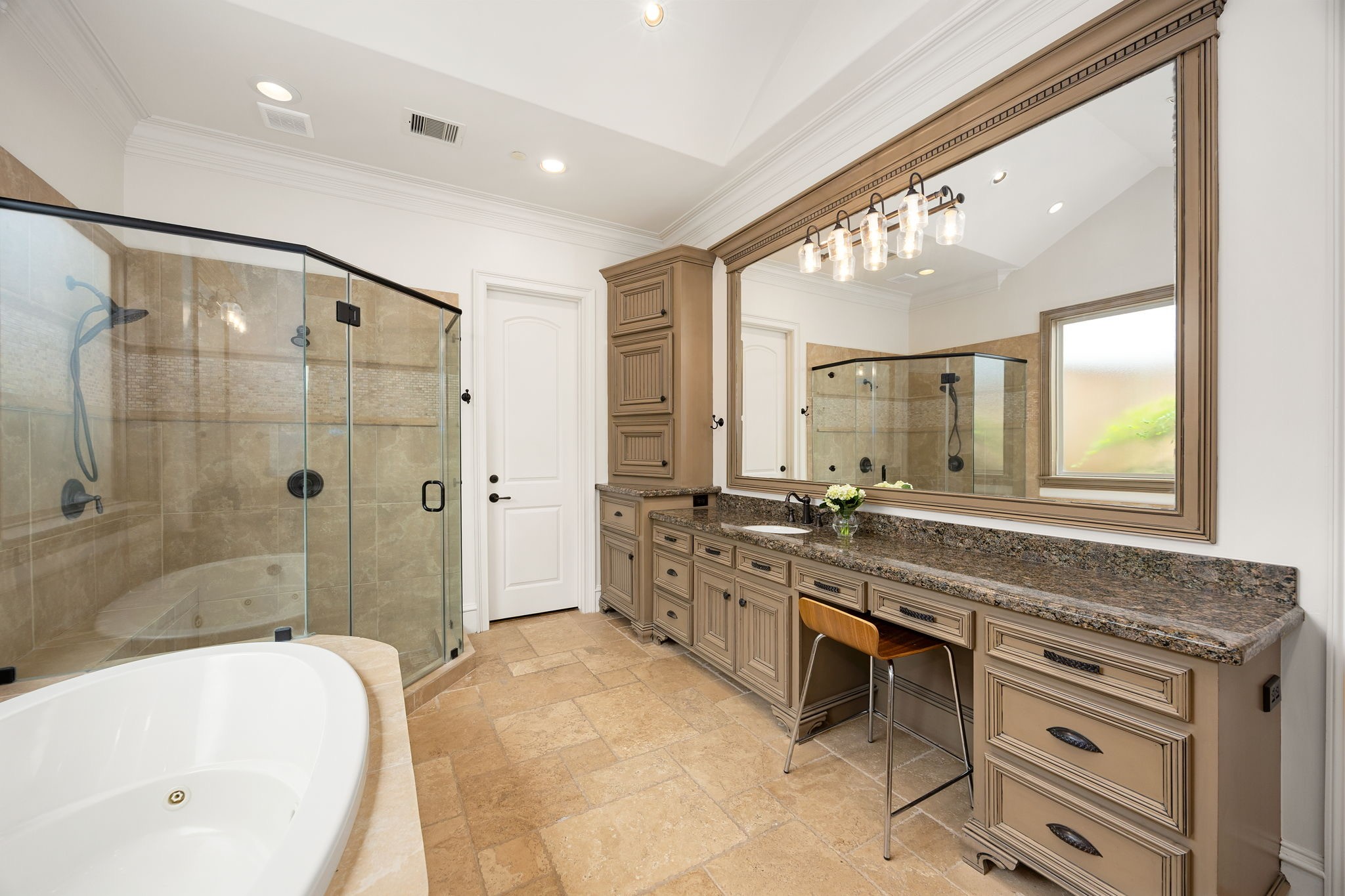 13310 Apple Tree Road Houston, TX 77079 - Photo 15 of 50 Primary bathroom has been freshly painted and has a vanity and lots of storage.