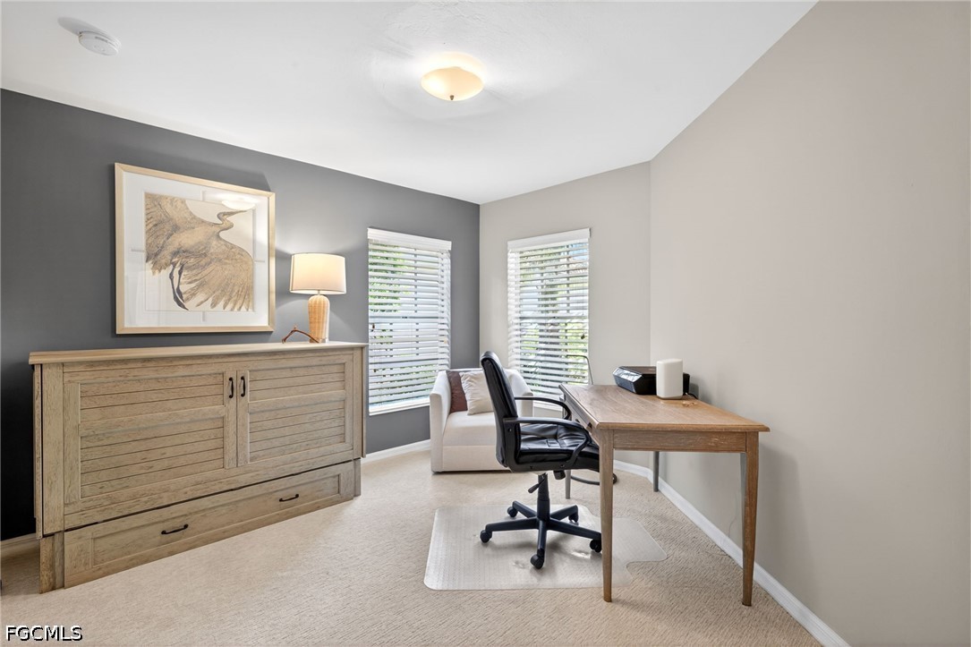 10082 Oakhurst Way Fort Myers, FL 33913 - Photo 24 of 50 a view of a workspace with furniture and a window