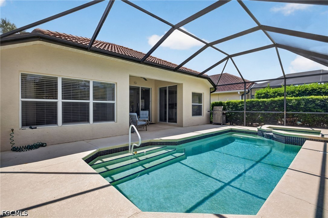 10082 Oakhurst Way Fort Myers, FL 33913 - Photo 29 of 50 a view of a house with a lounge chair