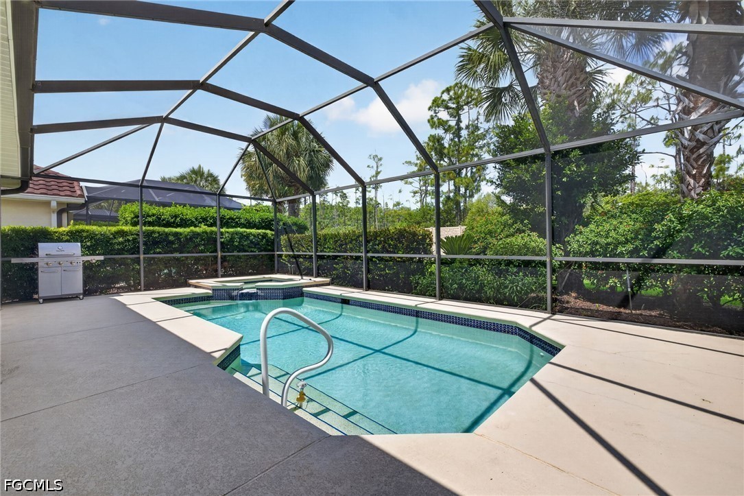 10082 Oakhurst Way Fort Myers, FL 33913 - Photo 3 of 50 a view of a house with a swimming pool