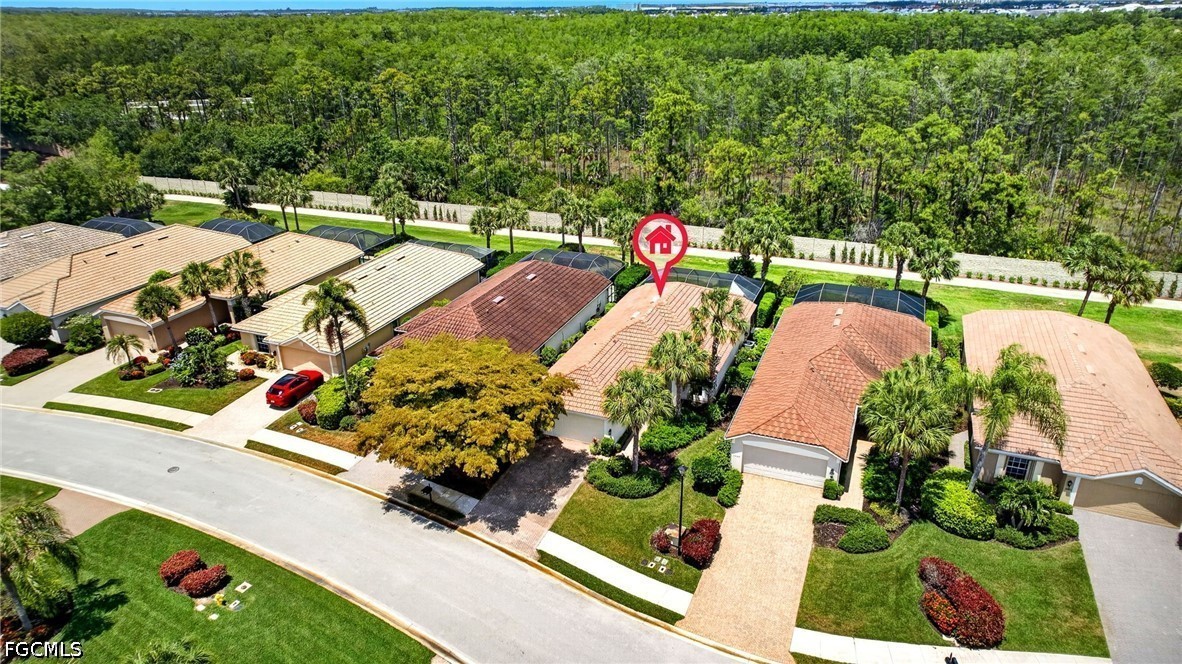10082 Oakhurst Way Fort Myers, FL 33913 - Photo 31 of 50 an aerial view of a house with yard swimming pool and outdoor seating