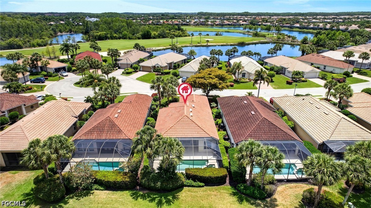10082 Oakhurst Way Fort Myers, FL 33913 - Photo 35 of 50 an aerial view of a building with garden space and lake view