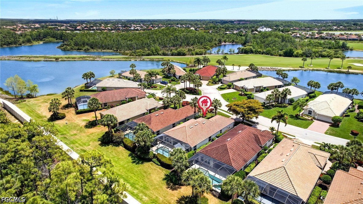 10082 Oakhurst Way Fort Myers, FL 33913 - Photo 36 of 50 an aerial view of a house with a lake view