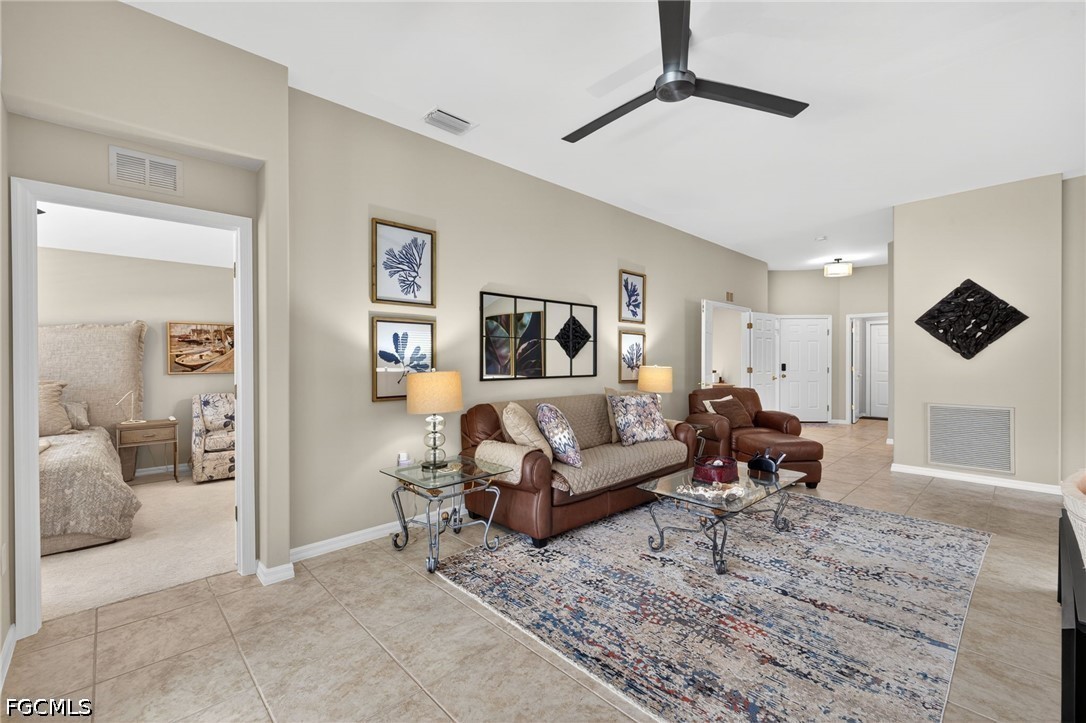 10082 Oakhurst Way Fort Myers, FL 33913 - Photo 5 of 50 a living room with furniture and a rug