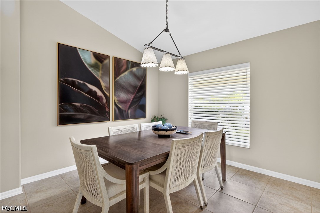10082 Oakhurst Way Fort Myers, FL 33913 - Photo 8 of 50 a view of a dining room that has a table and chairs