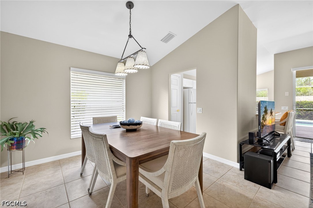 10082 Oakhurst Way Fort Myers, FL 33913 - Photo 9 of 50 a view of a dining room with furniture window and outside view