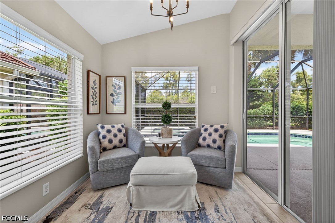 10082 Oakhurst Way Fort Myers, FL 33913 - Photo 10 of 50 a living room with furniture and a large window