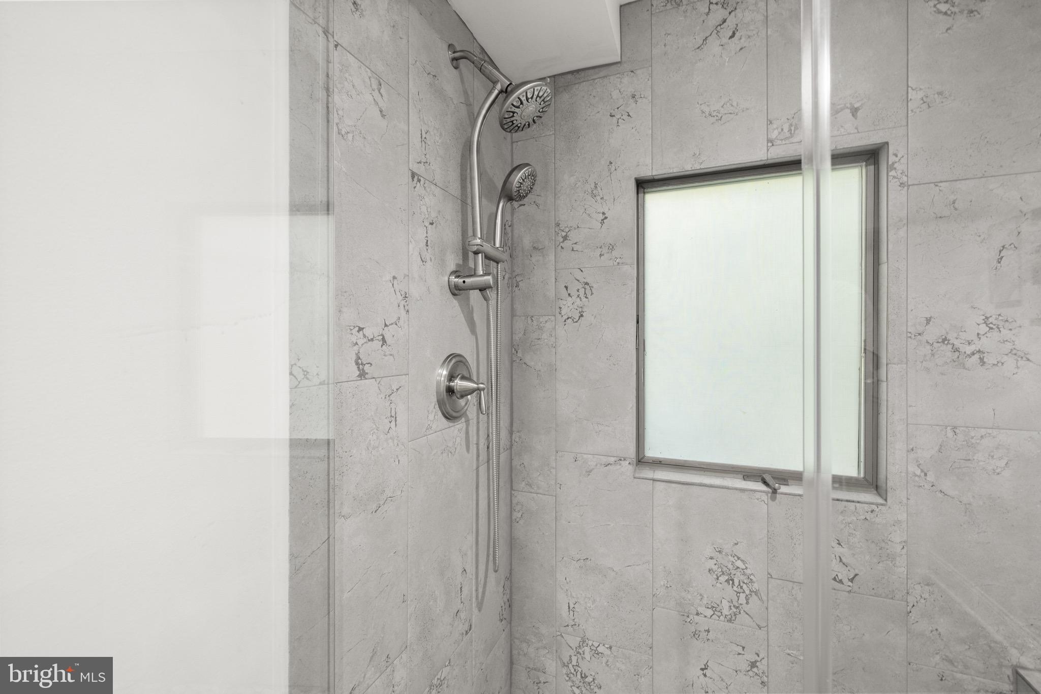 719 Mission Road Harpers Ferry, WV 25425 - Photo 12 of 37 a bathroom with a glass shower door