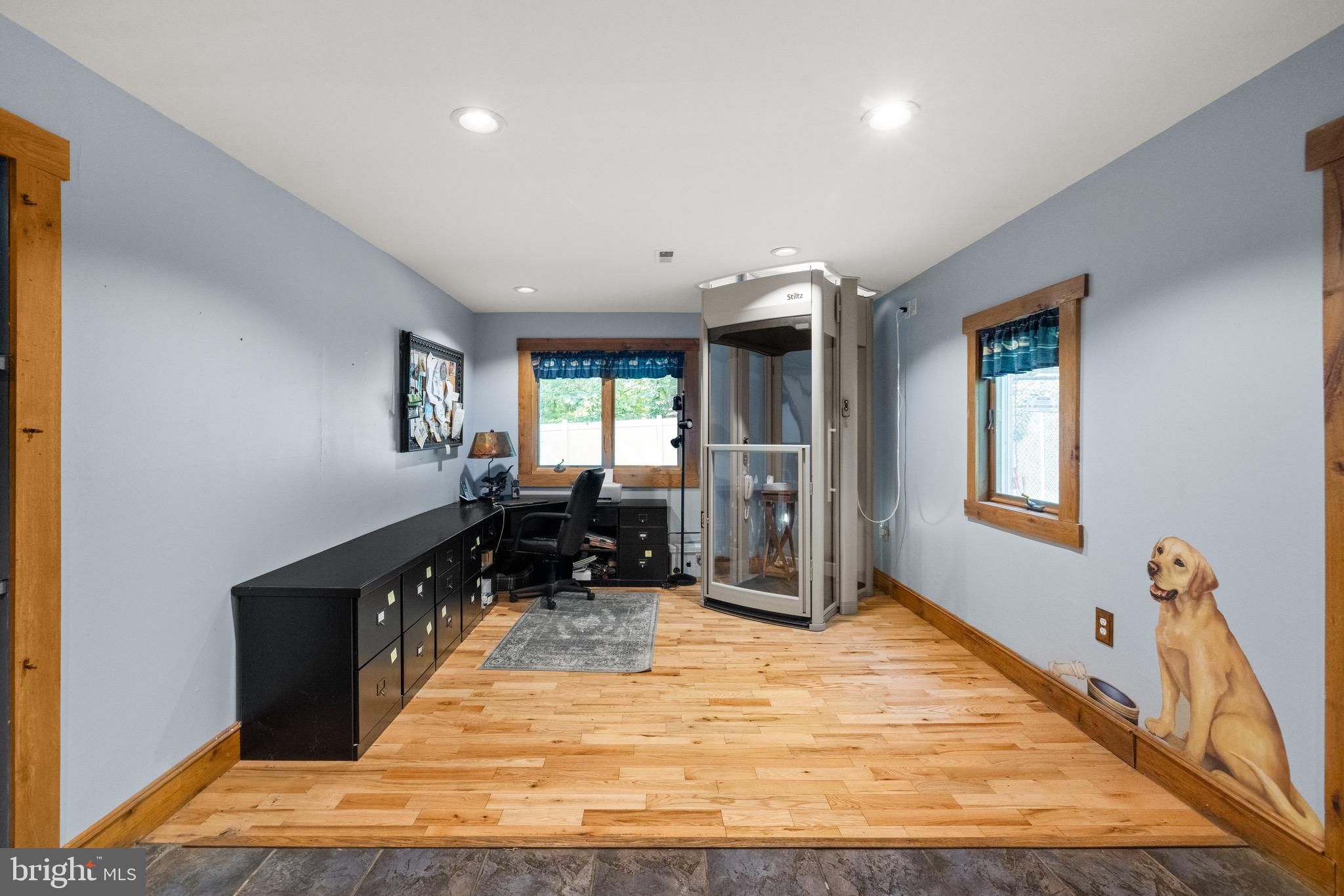 719 Mission Road Harpers Ferry, WV 25425 - Photo 14 of 37 a view of a livingroom with wooden floor and furniture