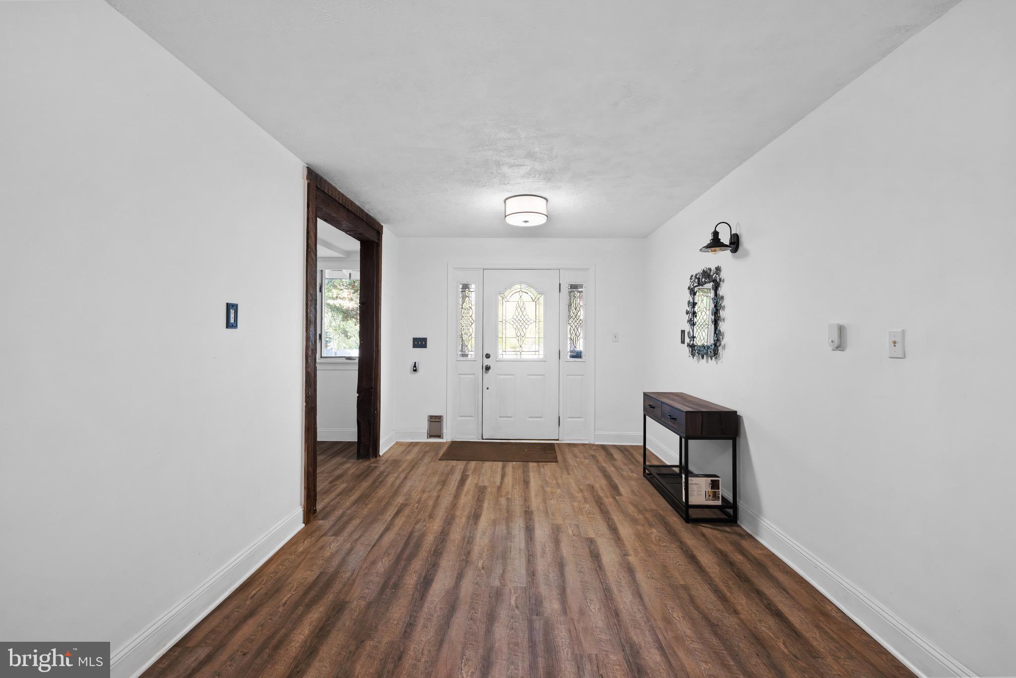 719 Mission Road Harpers Ferry, WV 25425 - Photo 3 of 37 a view of a livingroom with wooden floor