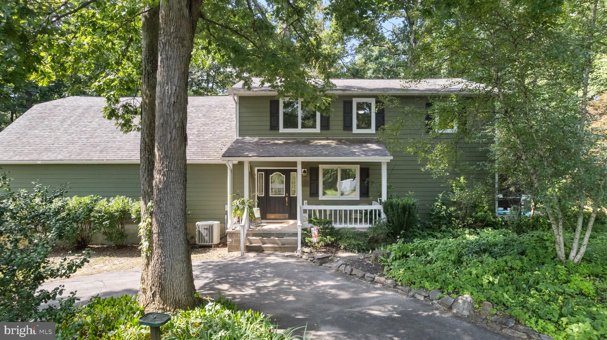 719 Mission Road Harpers Ferry, WV 25425 - Photo 31 of 37 a front view of a house with garden