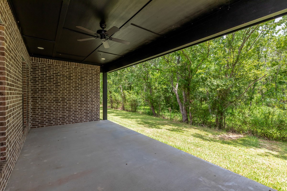 7705 Water Edge Beaumont, TX 77707 - Photo 34 of 39 a view of a room with a large tree