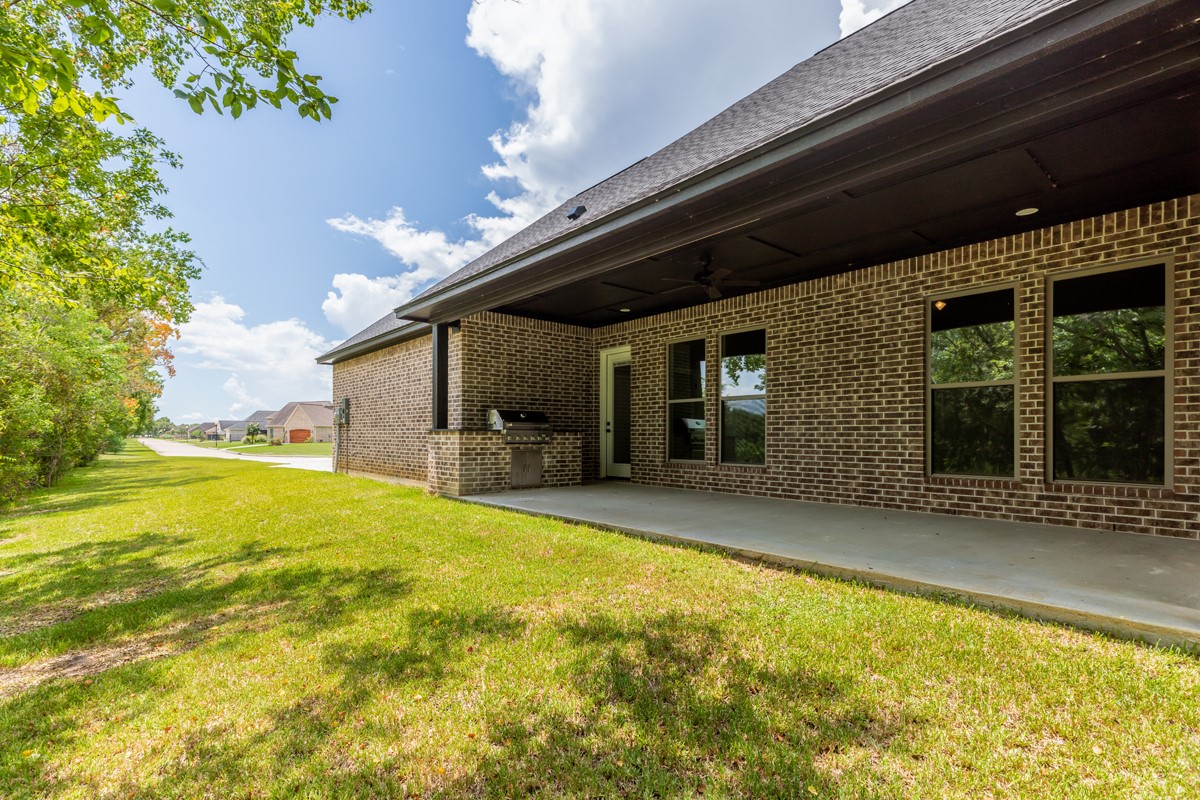 7705 Water Edge Beaumont, TX 77707 - Photo 36 of 39 a view of swimming pool with an outdoor space