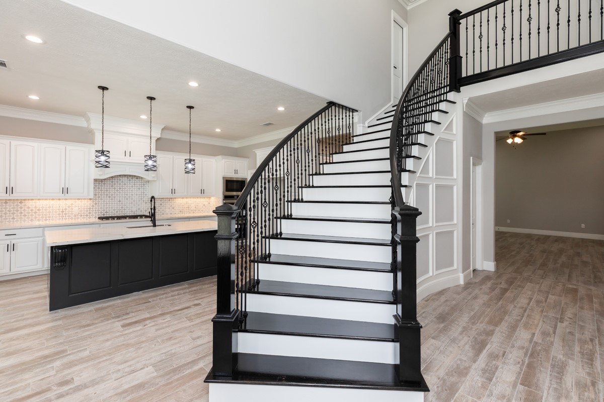 7705 Water Edge Beaumont, TX 77707 - Photo 5 of 39 a view of entryway and hall with wooden floor