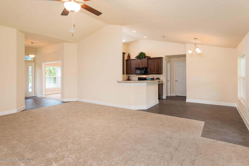 1142 Wilcox Road Southeast Palm Bay, FL 32909 - Photo 8 of 15 Family Room (sample photo)