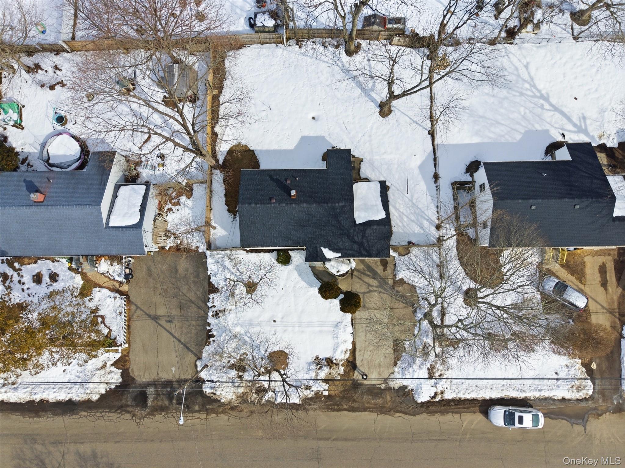 717 Doane Avenue Bellport, NY 11713 - Photo 21 of 22 View of snowy aerial view