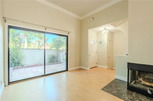 a view of livingroom with furniture and front door
