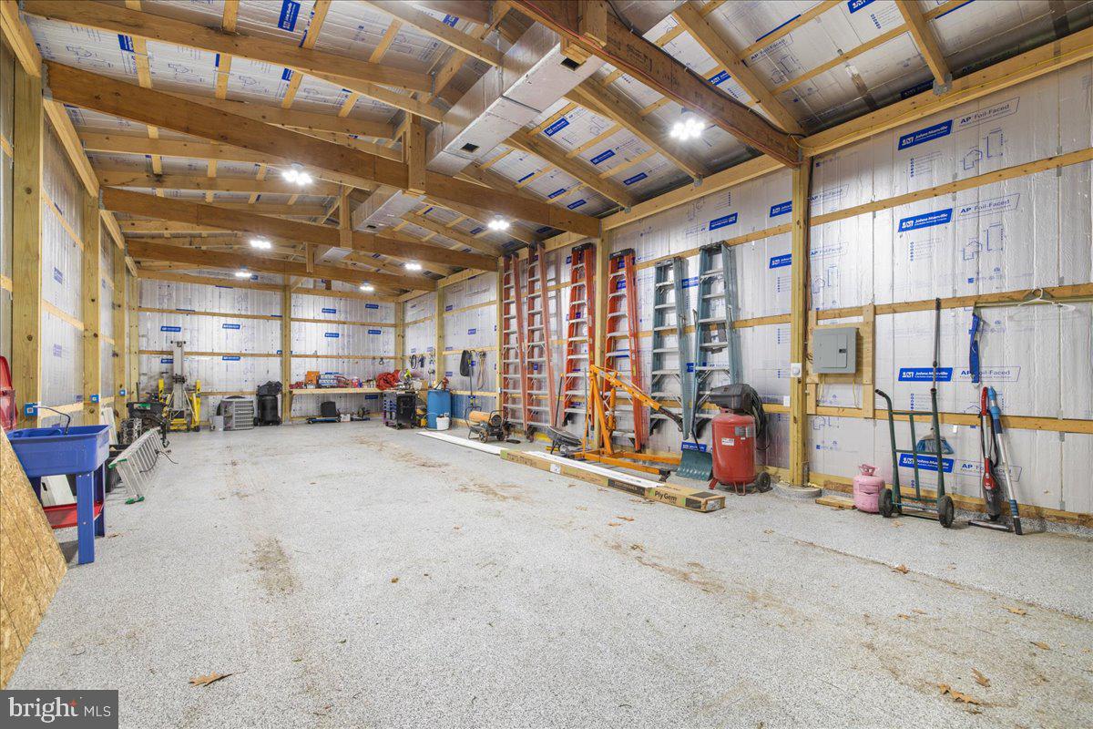 7965 Tick Neck Road Pasadena, MD 21122 - Photo 54 of 63 a view of a room with gym equipment
