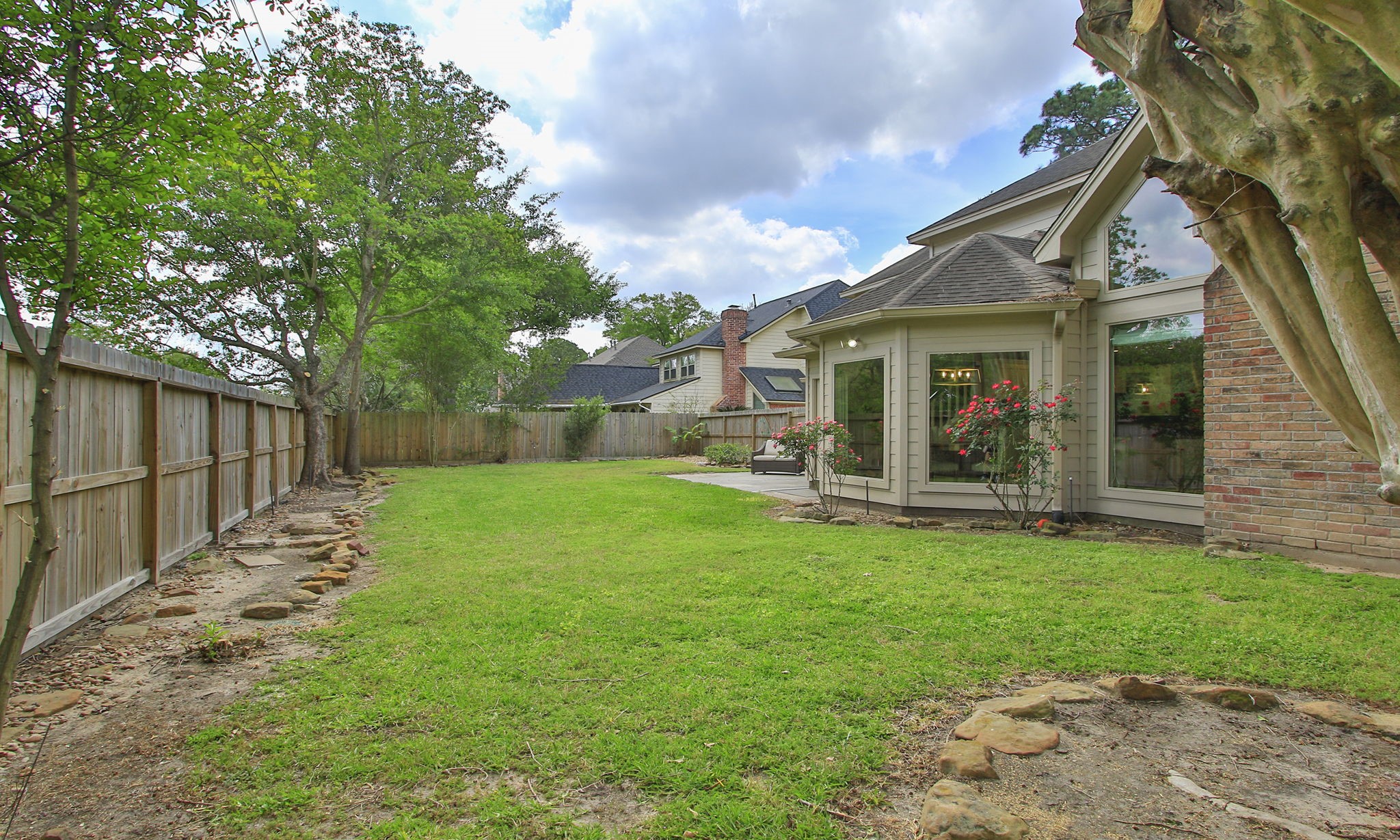 17618 Hidden Forest Drive Spring, TX 77379 - Photo 45 of 49 a view of a house with a yard and sitting area