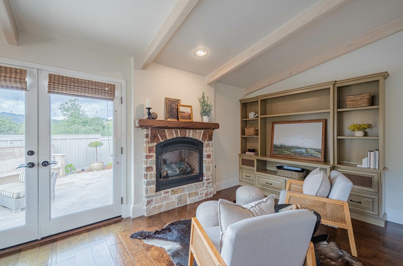 25603 Creekview Circle Salinas, CA 93908 - Photo 22 of 66 a living room with furniture and a fireplace