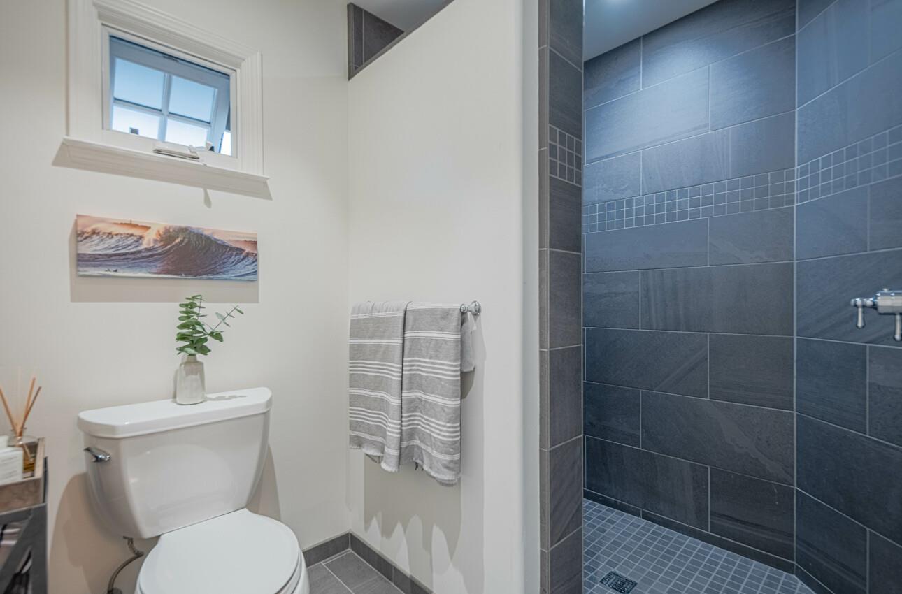 25603 Creekview Circle Salinas, CA 93908 - Photo 60 of 66 a white toilet sitting next to a bathroom sink