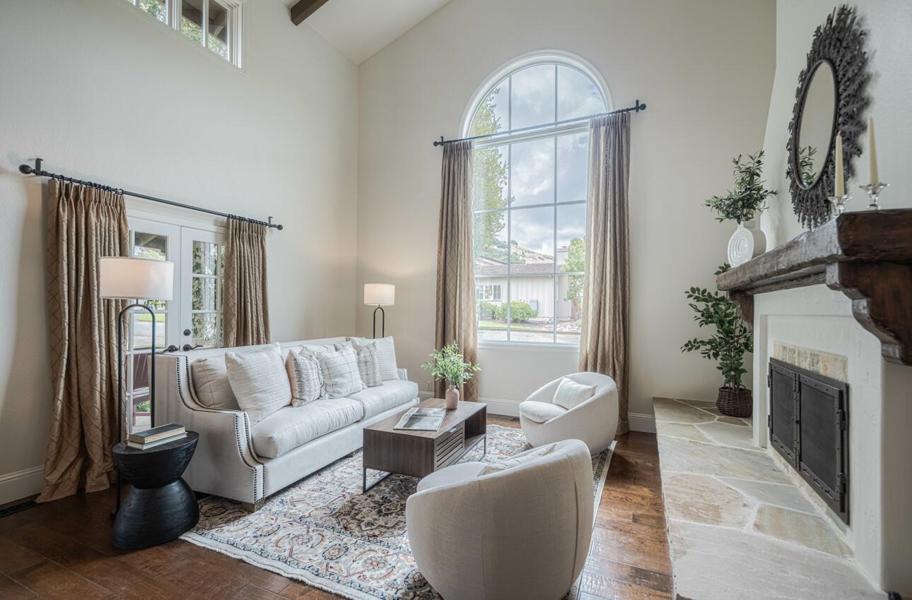25603 Creekview Circle Salinas, CA 93908 - Photo 9 of 66 a living room with furniture and a fireplace