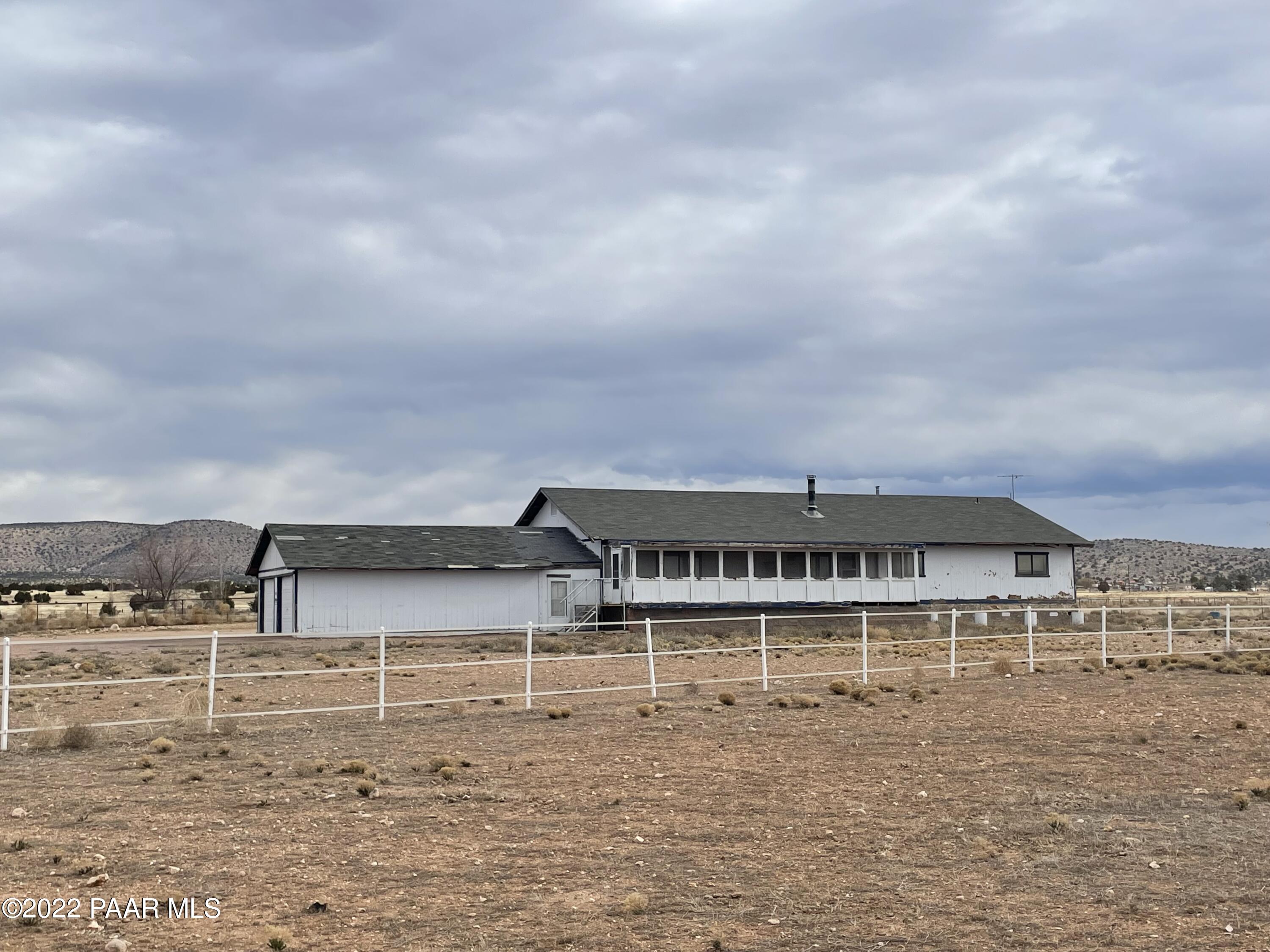 1300 West Big Sky Ranch Road Paulden, AZ 86334 - Photo 2 of 29 a view of building with sky view