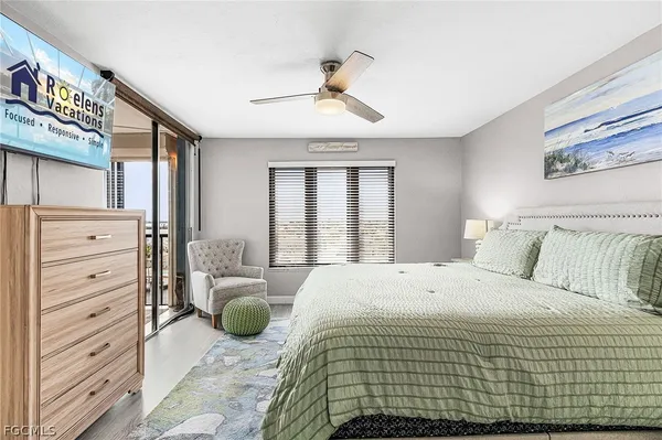 a bedroom with a bed and furniture