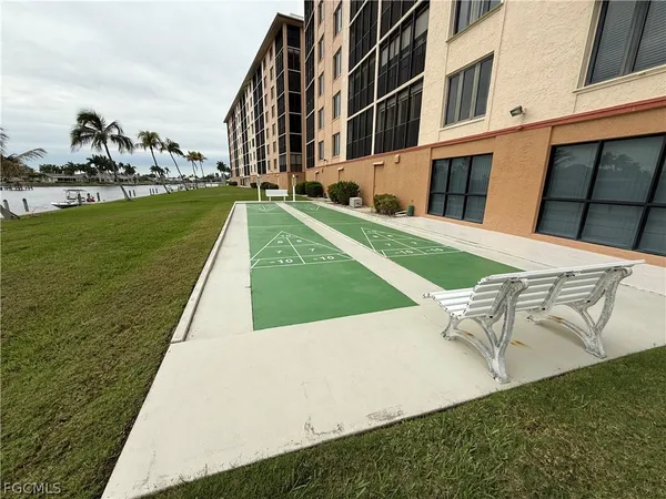 a view of building with yard