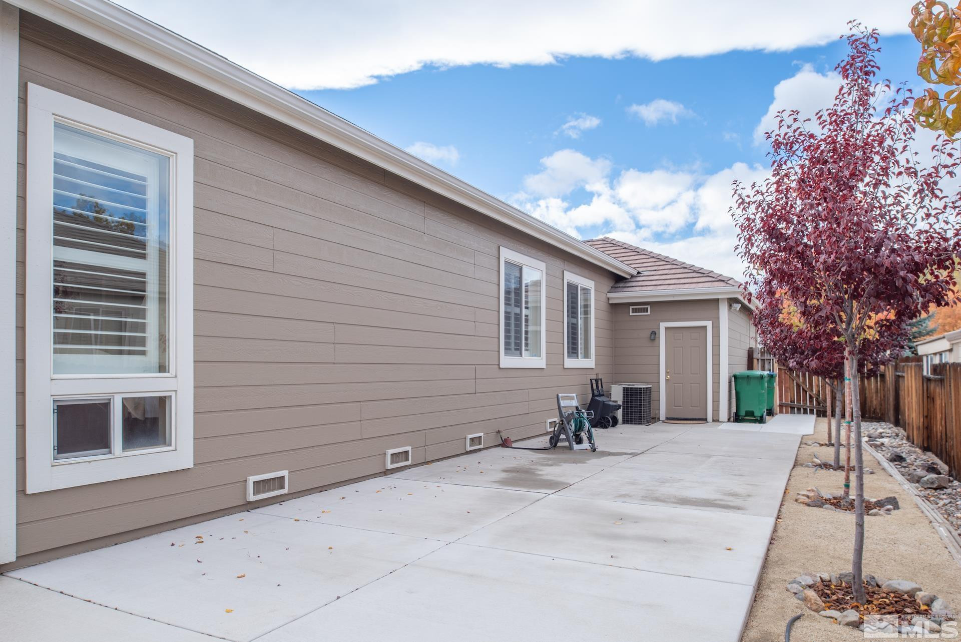 450 Flanders Road Reno, NV 89511 - Photo 25 of 36 a view of a house with a patio