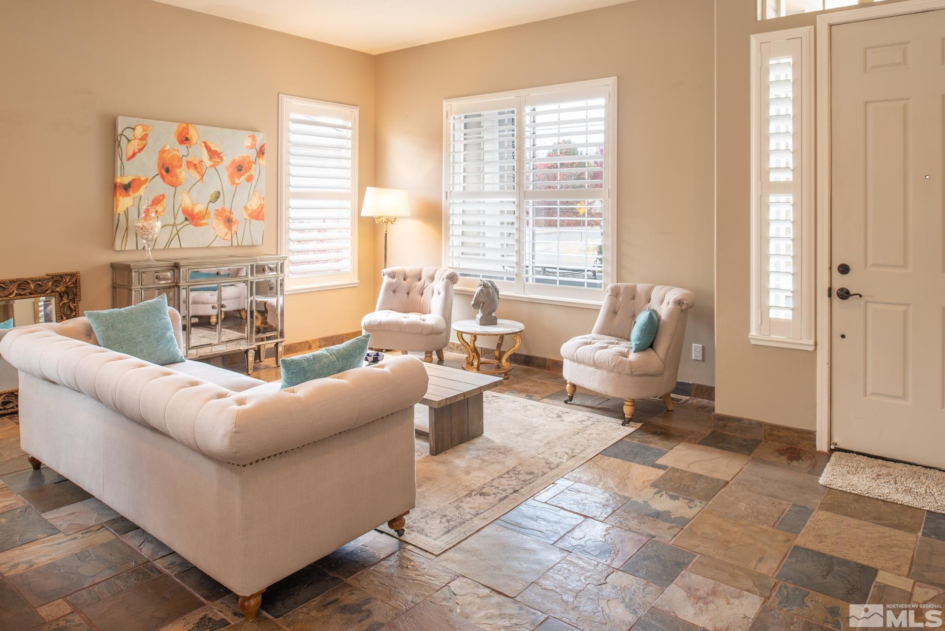 450 Flanders Road Reno, NV 89511 - Photo 6 of 36 a living room with furniture and a large window