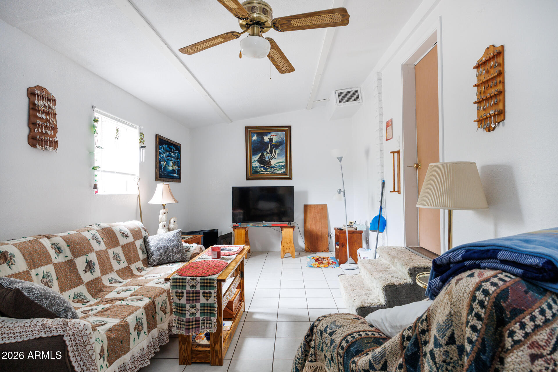 6185 East Monitor Street Picacho, AZ 85141 - Photo 43 of 55 a living room with furniture and a flat screen tv