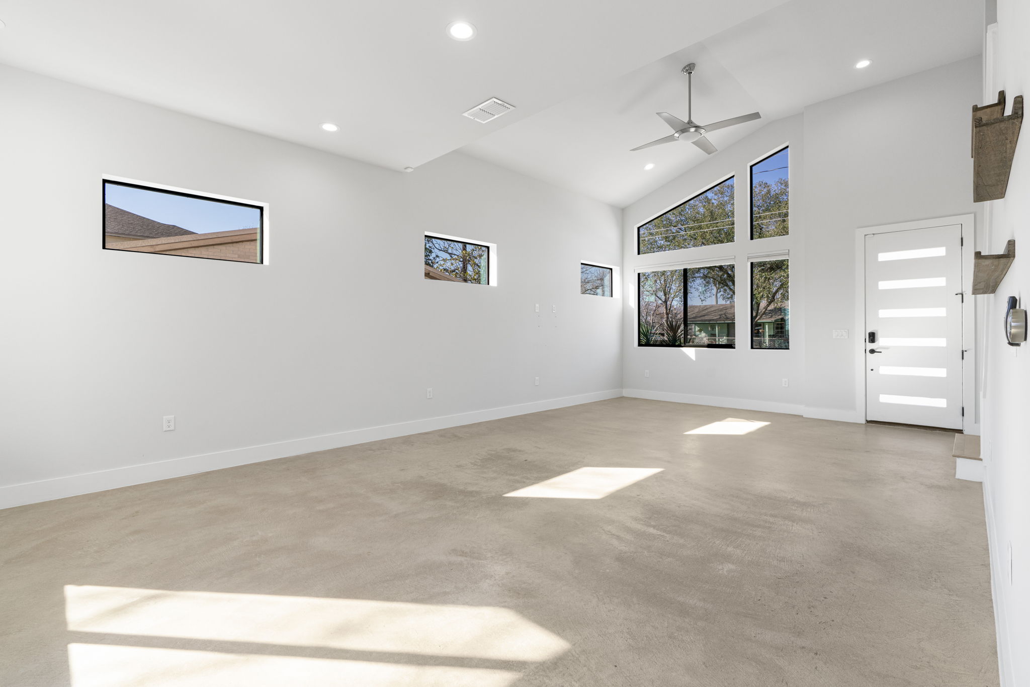 1405 Perez Street, Unit 1 Austin, TX 78721 - Photo 8 of 30 Transom windows add a nice touch and bring in additional natural light.
