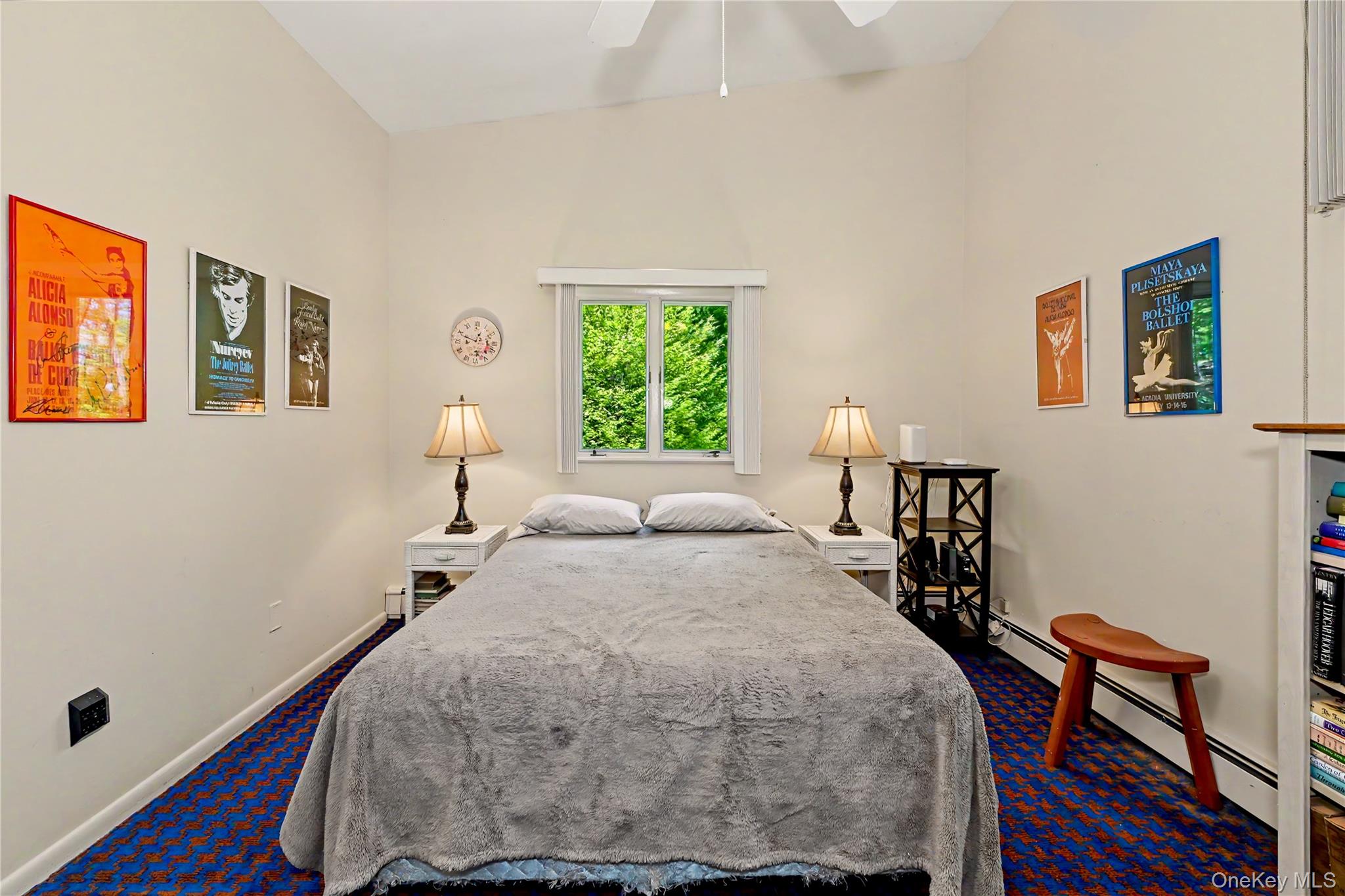631 Croton Falls Road Carmel, NY 10512 - Photo 23 of 43 a bedroom with a bed and a desk