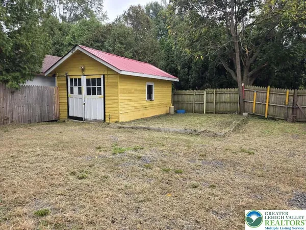 a view of backyard of house