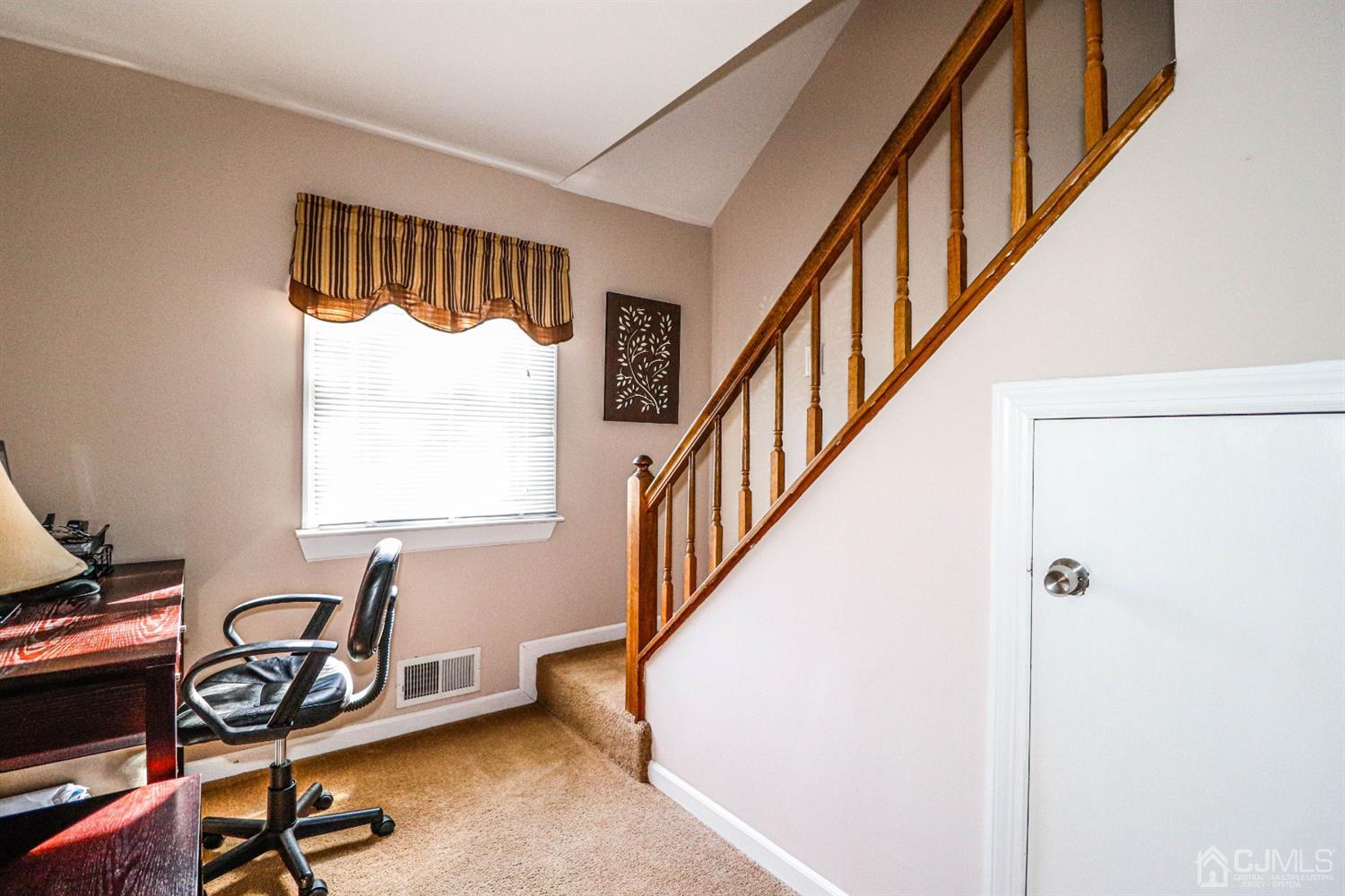 3 Avon Road Edison, NJ 08817 - Photo 18 of 39 a view of a hallway with workspace