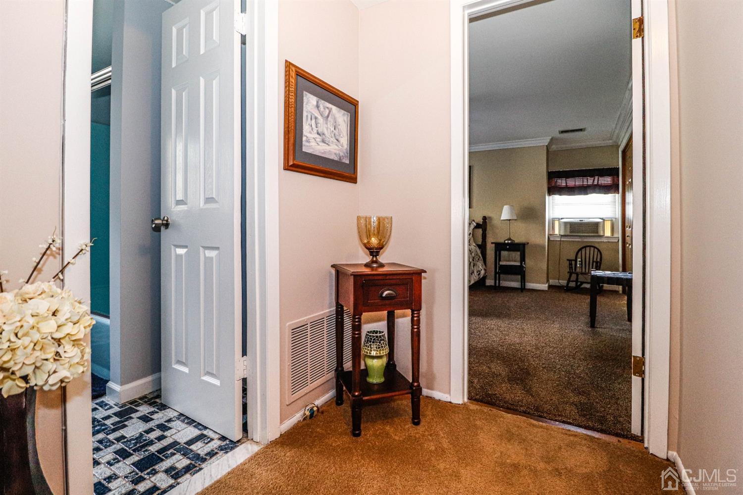3 Avon Road Edison, NJ 08817 - Photo 20 of 39 a view of a livingroom with furniture and front door