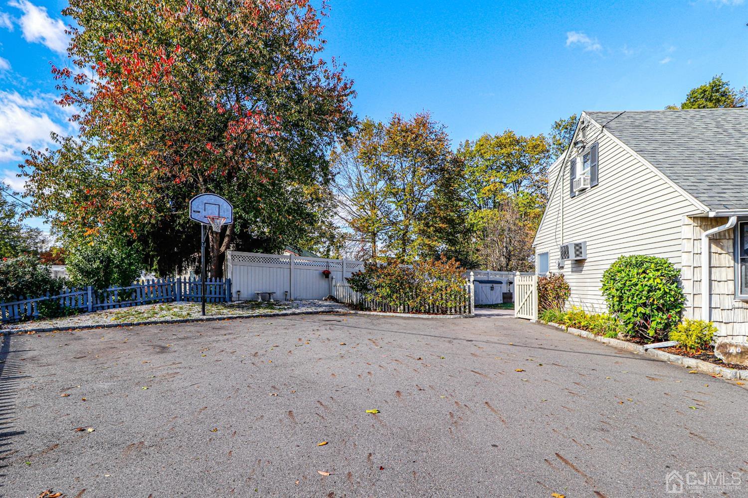 3 Avon Road Edison, NJ 08817 - Photo 4 of 39 a view of a house with a yard and potted plants