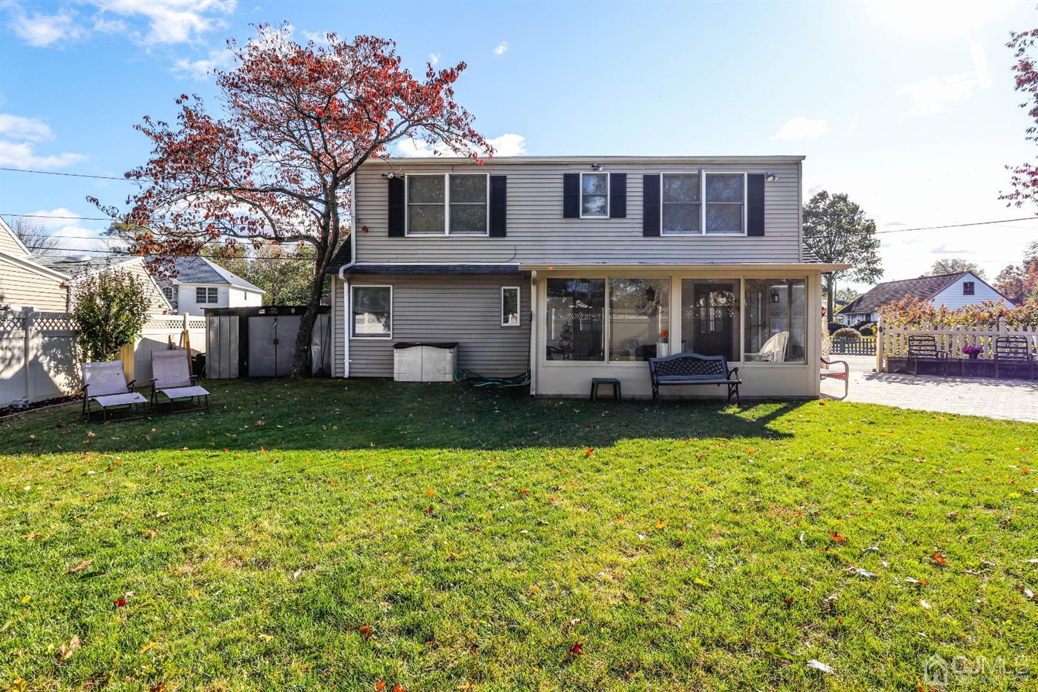 3 Avon Road Edison, NJ 08817 - Photo 36 of 39 a view of a house with a yard patio and swimming pool