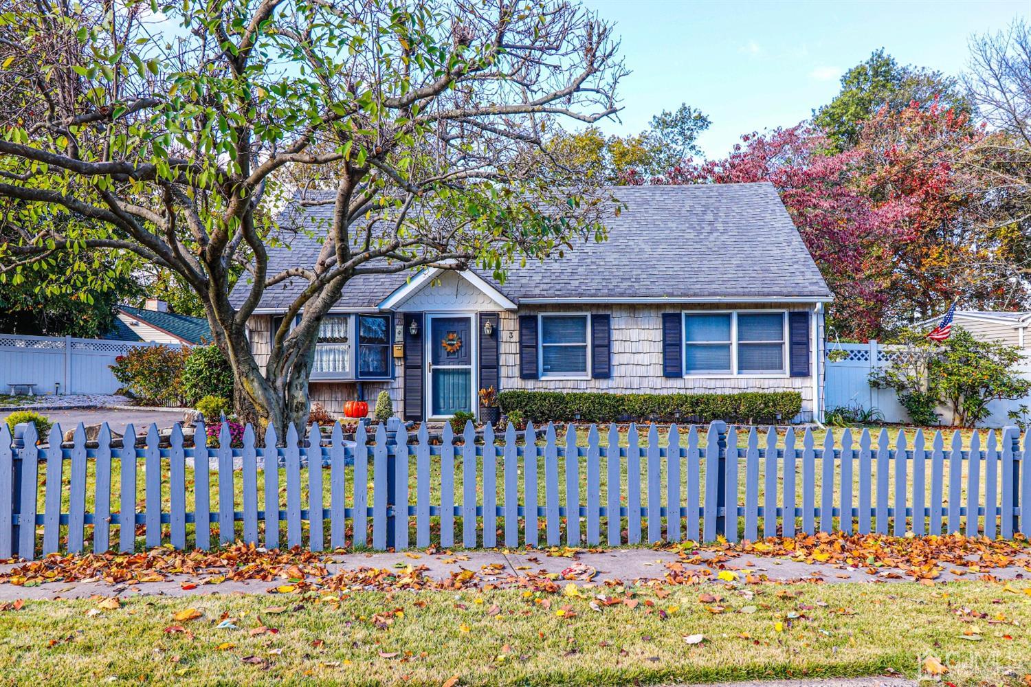 3 Avon Road Edison, NJ 08817 - Photo 38 of 39 a front view of a house with a fence