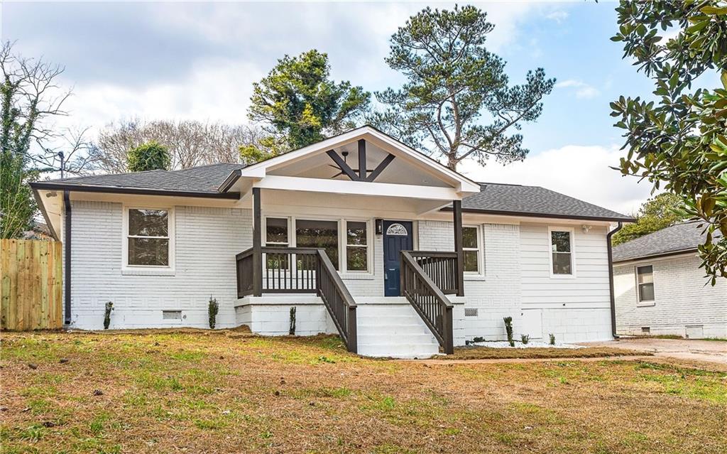 2113 Miriam Lane Decatur, GA 30032 - Photo 1 of 1 a front view of a house with a yard