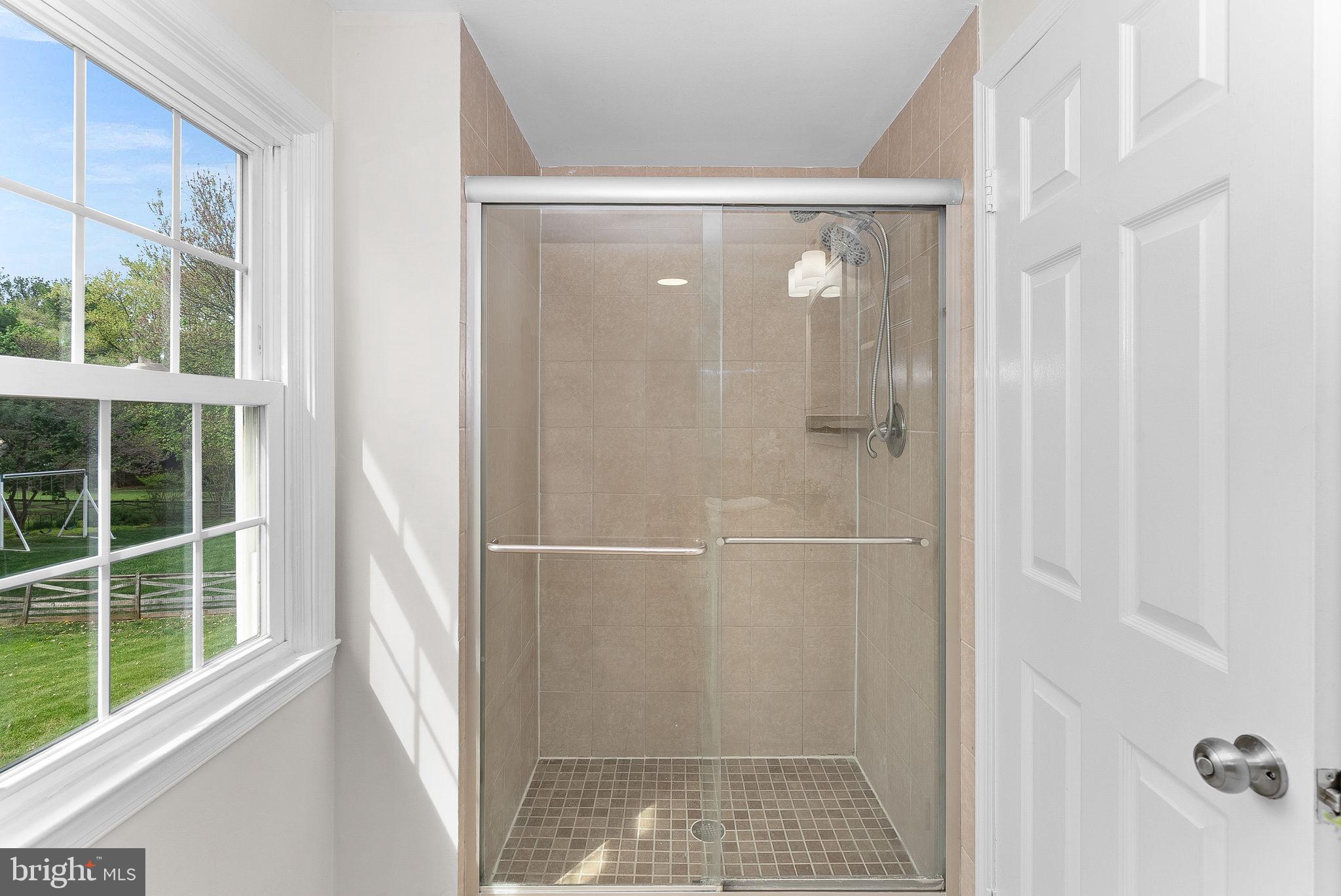 105 Peyton Road Sterling, VA 20165 - Photo 41 of 68 Stand-up shower in primary bathroom
