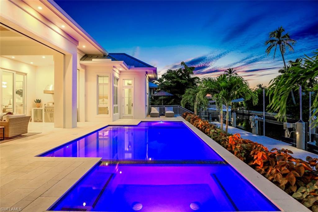 2130 Tarpon Road Naples, FL 34102 - Photo 15 of 35 a view of swimming pool with a patio