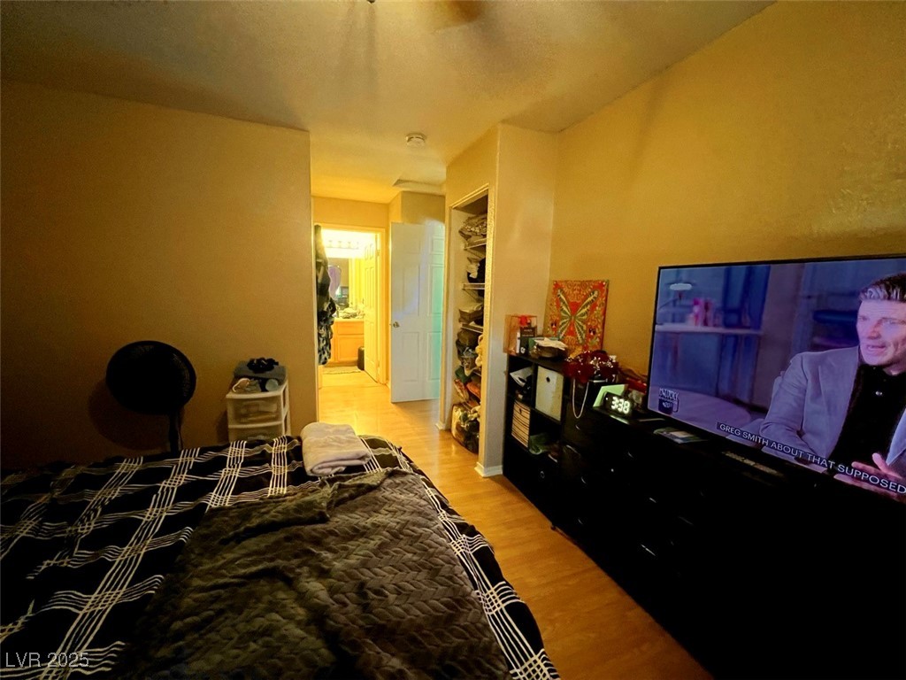 4730 East Craig Road, Unit 2071 Las Vegas, NV 89115 - Photo 11 of 23 Bedroom with light wood finished floors