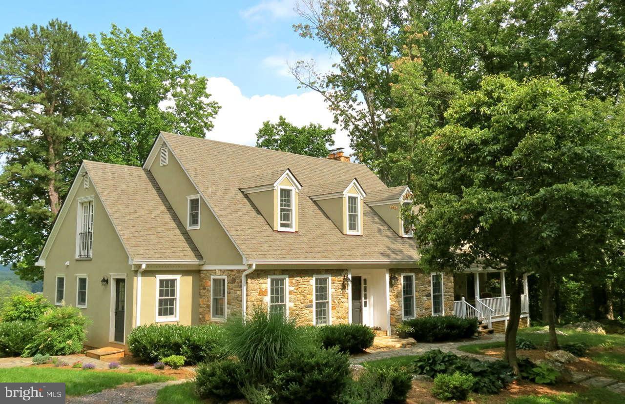 362 Tiger Valley Road Washington, VA 22747 - Photo 1 of 26 Front of the house with porch and slate walkways