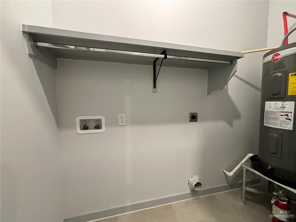 921 Jay Avenue, Unit 9 Mission, TX 78572 - Photo 8 of 8 a view of a room with rack on the wall