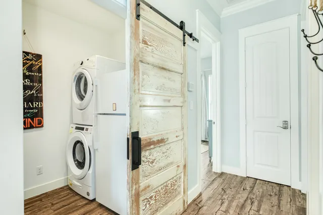 a bathroom with a granite countertop shower and a sink