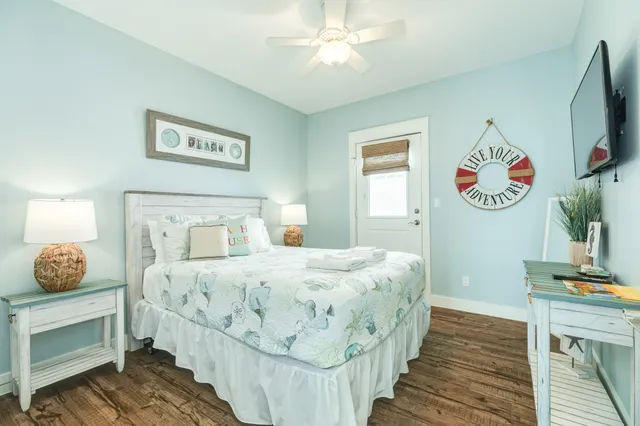 a bedroom with bed and a window